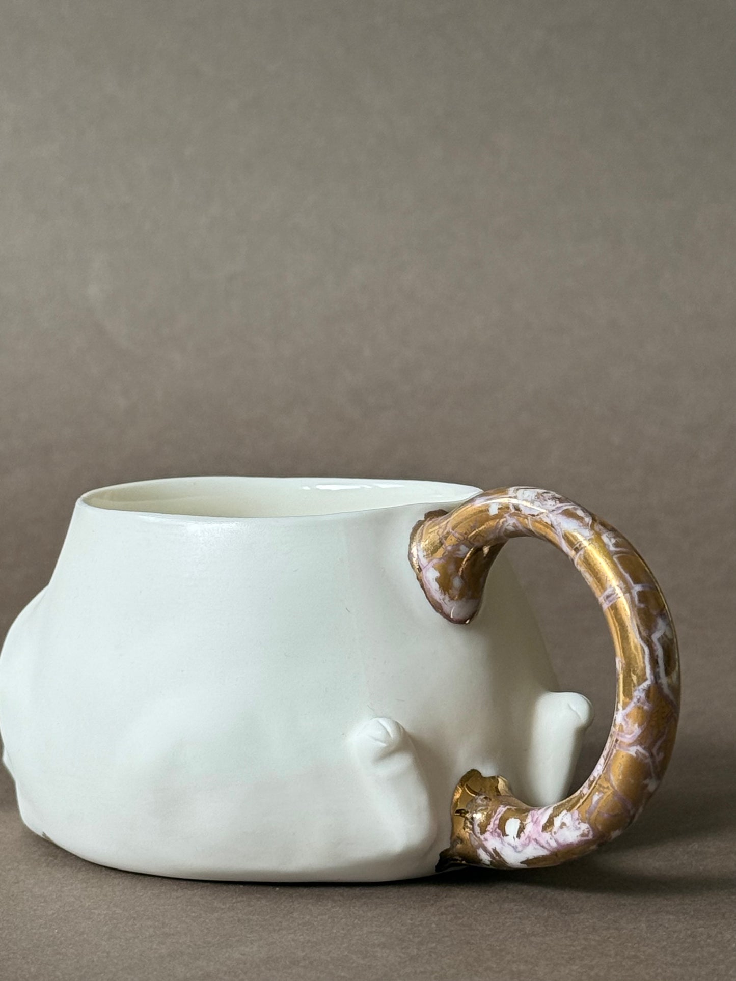 Porcelain Cat with gold marble tail