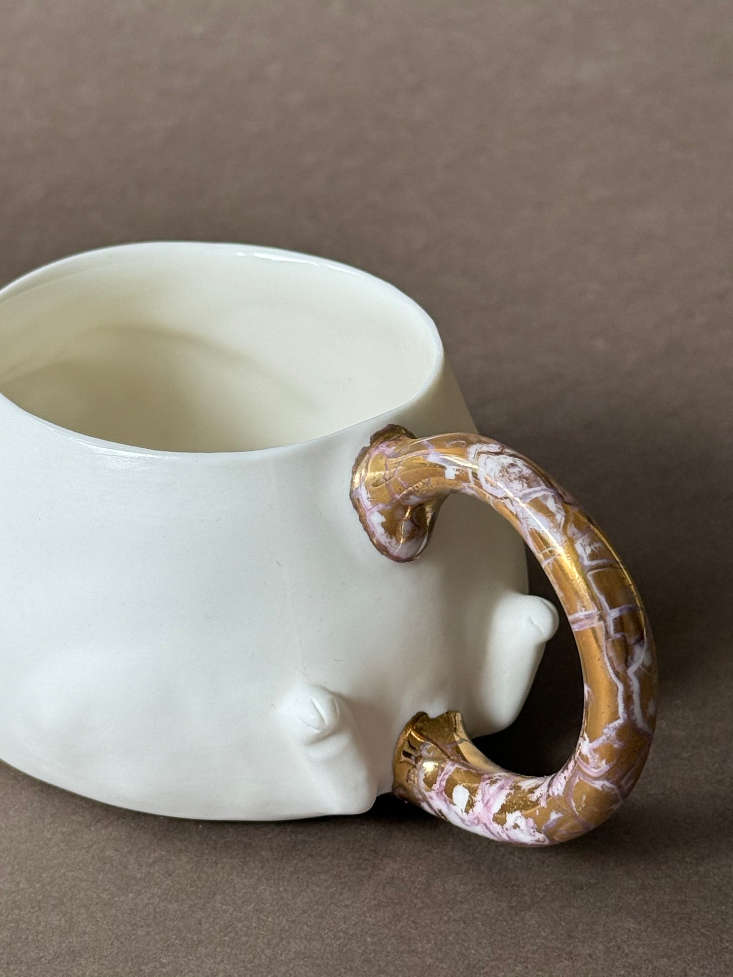 Porcelain Cat with gold marble tail
