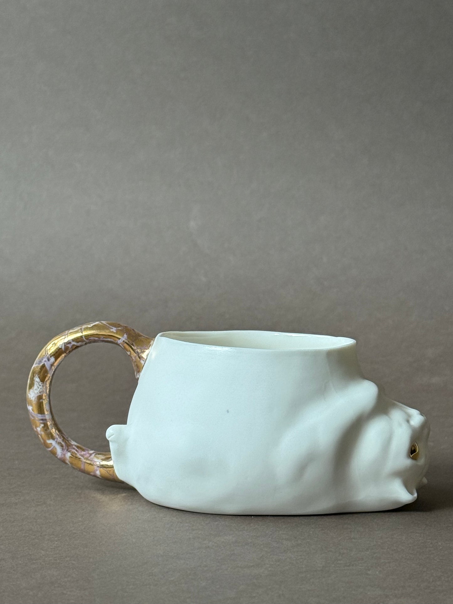 Porcelain Cat with gold marble tail