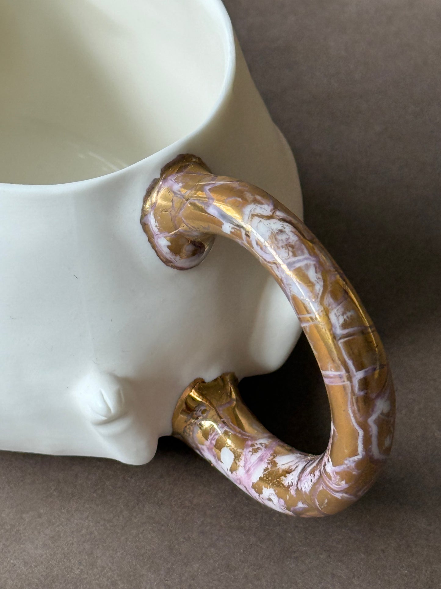 Porcelain Cat with gold marble tail