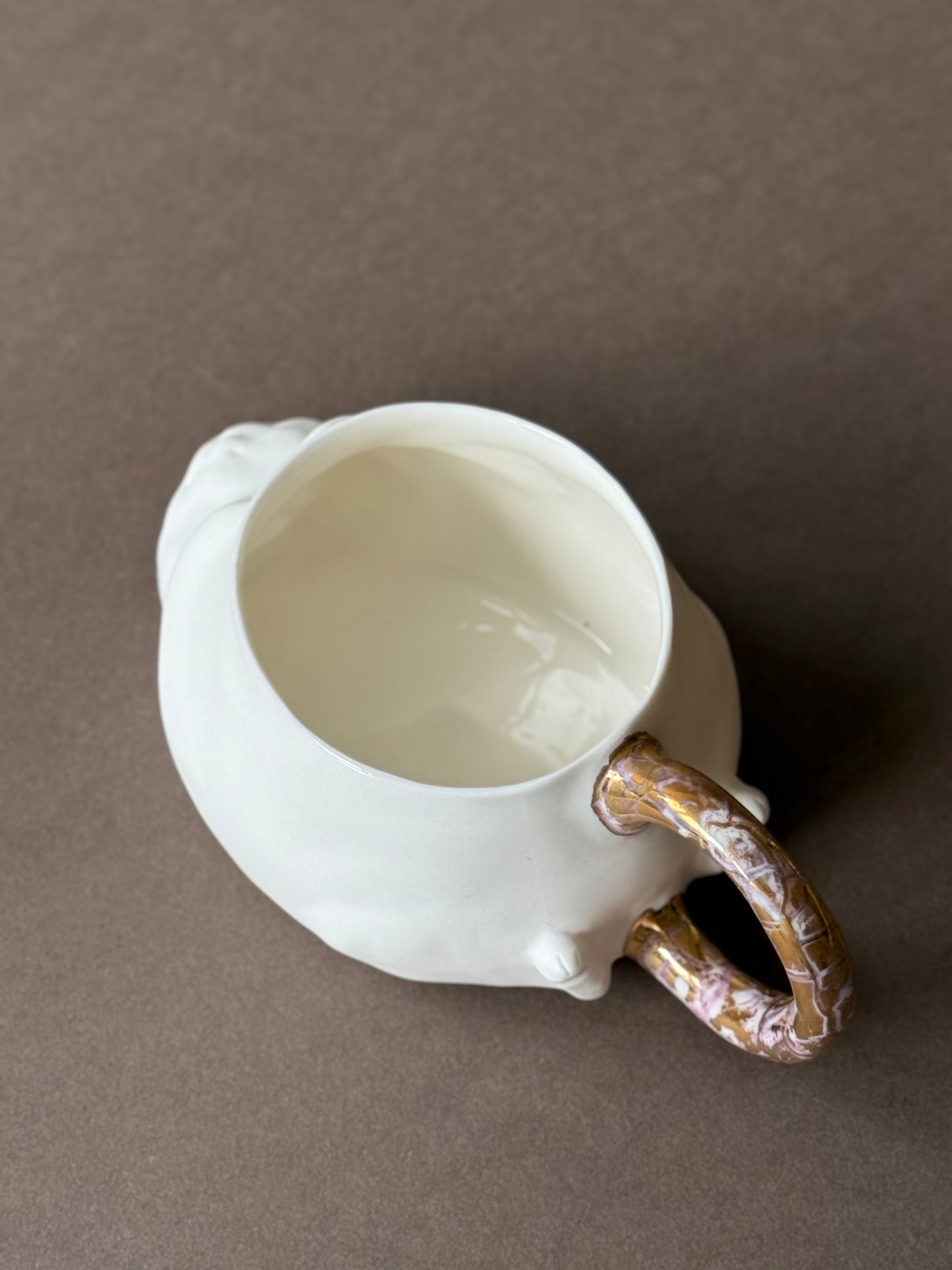 Porcelain Cat with gold marble tail