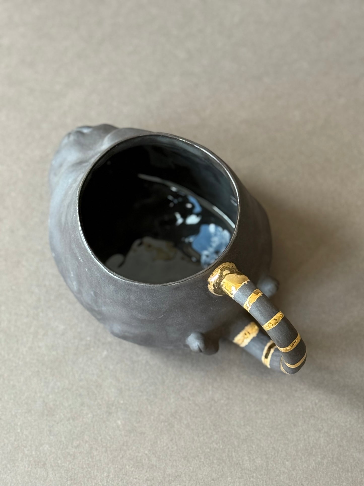 Semi-porcelain Cat with gold striped tail