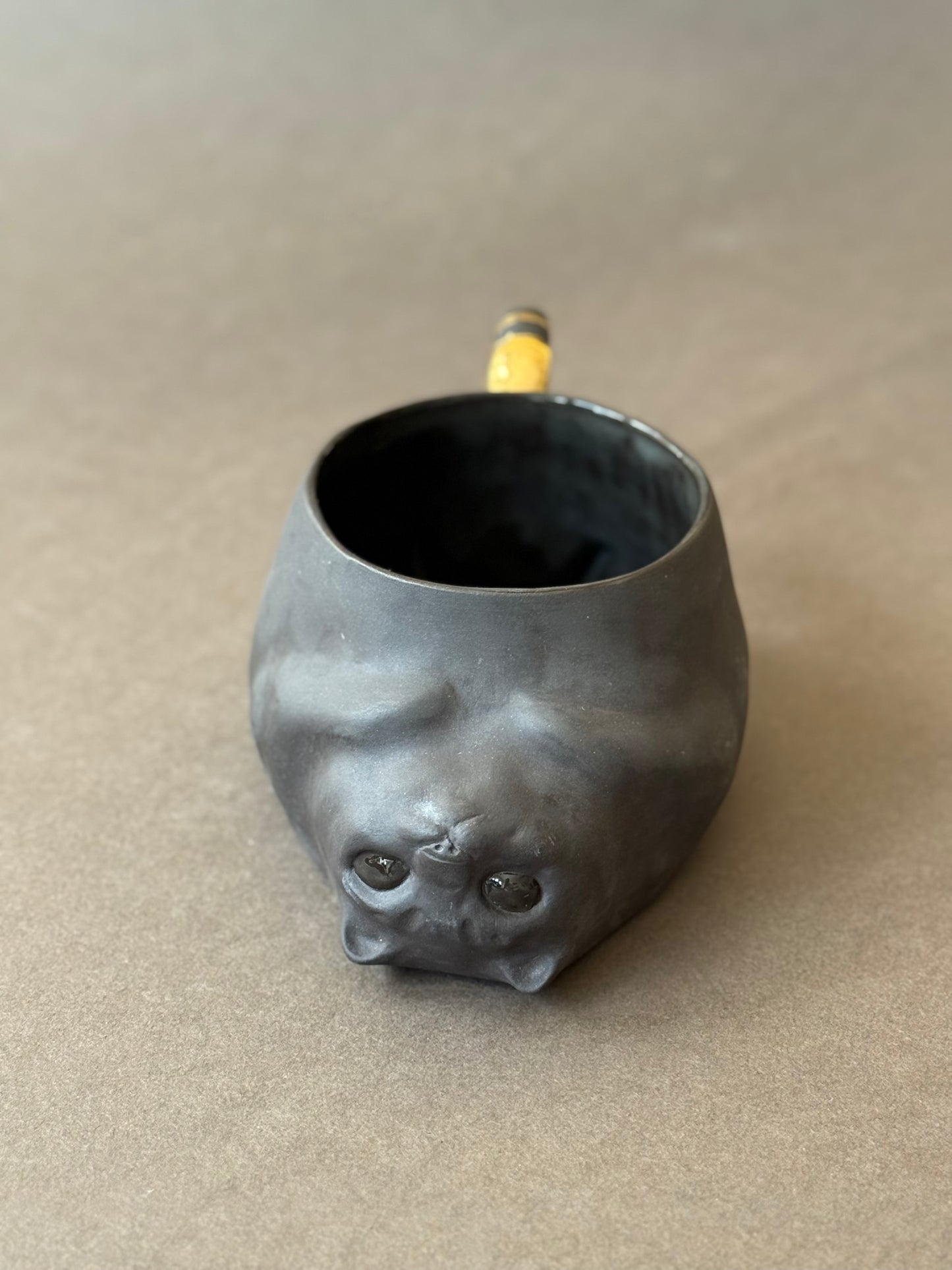 Semi-porcelain Cat with gold striped tail