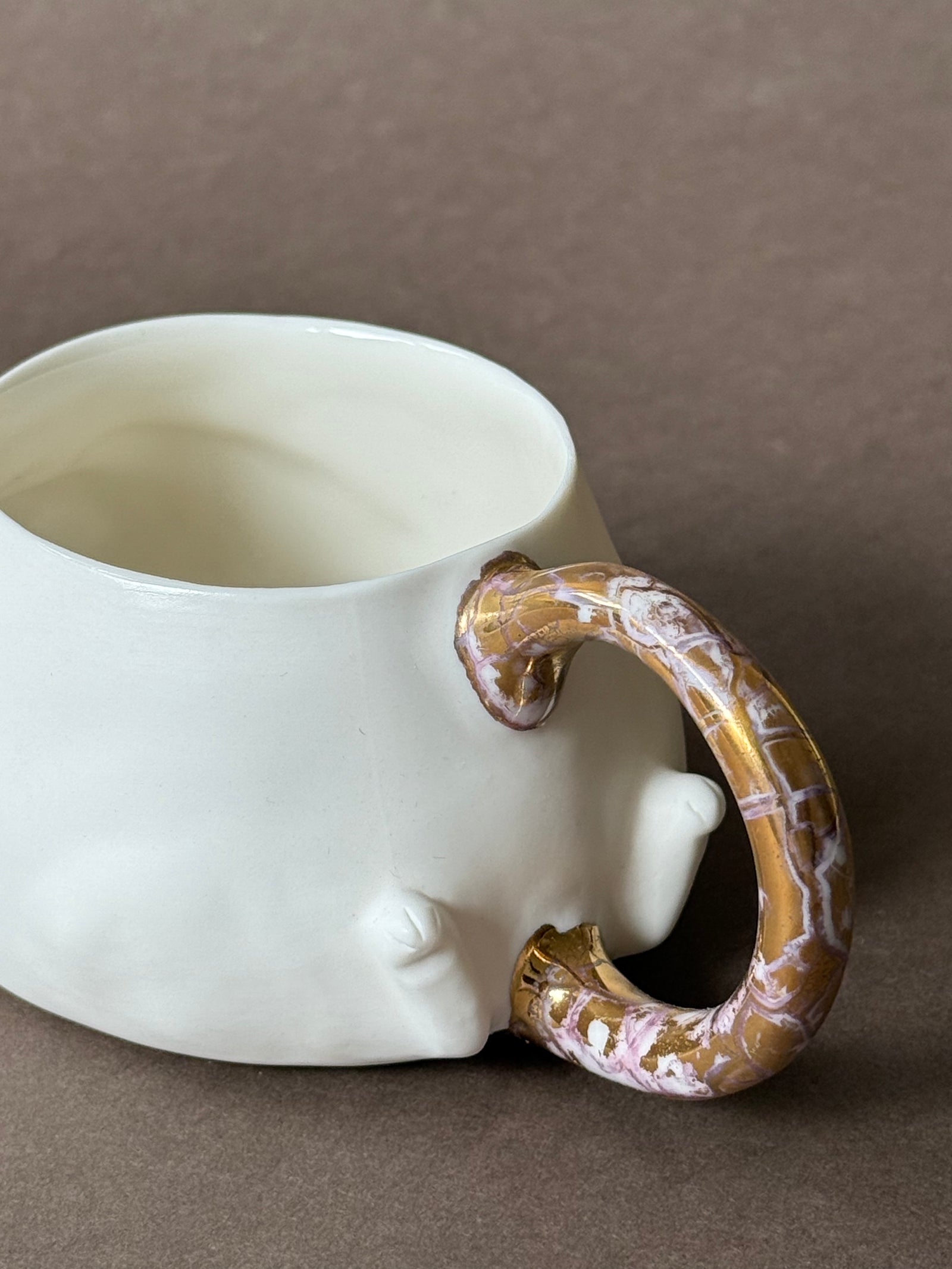 Porcelain Cat with gold marble tail